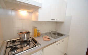 apartmánový dom Gemini s bazénom a záhradou v časti Pineda v Bibione, zájazdy autobusovou a ind. dopravou CK TURANCAR