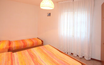 dom EDEN v BIBIONE, spálňa v trilocale typ C, dovolenka s CK TURANCAR