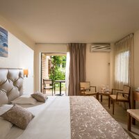 Grécko - Kréta - Hotel Bella beach-izba s výhľadom na záhradu-letecký zájazd CK Turancar-Kréta-Anissaras