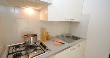 apartmánový dom Gemini s bazénom a záhradou v časti Pineda v Bibione, zájazdy autobusovou a ind. dopravou CK TURANCAR