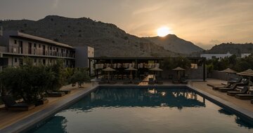 Hotel Cook´s Club - hotel s bazénom pri západe slnka - letecký zájazd CK Turancar (Rodos, Kolymbia)