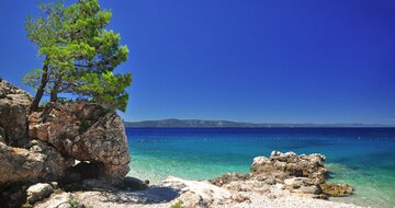 hotel Aurora - pláž - autobusový zájazd CK Turancar - Chorvátsko, Podgora